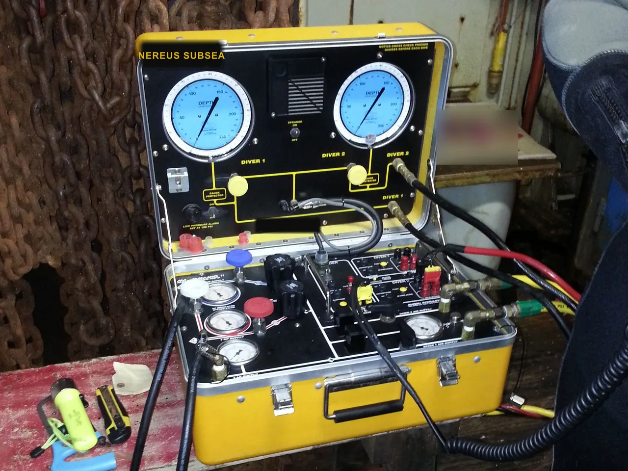 Two-diver surface-supplied air control panel set up on a workboat deck